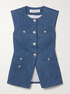 Veronica Beard's 'Tamara' vest is adorned with polished silver-tone buttons depicting the brand's regal crest. It's tailored from smooth denim and has a notched front, so it sits nicely over your hips. The full lining ensures a smooth fit. Luxury Miu Miu Tops For Workwear, Tailored Shirts For Women, Denim Vest With Buttons For Workwear, Classic Denim Workwear Vest With Pockets, Classic Denim Vest For Work, Classic Denim Vest With Button Closure For Work, Fitted Denim Vest With Button Closure For Work, Blue Denim Vest For Work With Buttons, Blue Fitted Denim Vest For Work