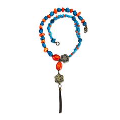 This limited edition long bold necklace is hand-crafted from natural blue howlite, turquoise, orange coral, and carnelian gemstones with goldtone metal inserts. Blue Howlite is a stone of patience and perspective. Turquoise can strengthen our connection to intuition, and it is also helpful for protection and purification. Carnelian is always keen to bring out your power. Coral is used to attract success and wealth and strengthens foresight. The necklace is for a playful but strong woman, whose d Attract Success, Pink Gemstone Necklace, Abstract Necklace, February Birthstone Necklace, Blue Howlite, Coral Beads Necklace, Floral Pendant Necklace, Bold Necklace, Long Beaded Necklace