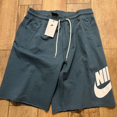 The Nike Sportswear Shorts Feature Unfinished Hems And A Ribbed Waist With Drawcord For A Vintage Vibe. French Terry Cotton Delivers A Soft Touch And Everyday Durability. Shown: Midnight Navy/White Style: At5267-410 Summer Sports Sweatpants With Drawstring, Blue Cotton Sportswear Joggers, Sporty Cotton Pants With Built-in Shorts, Blue Drawstring Shorts For Leisure, Blue Drawstring Leisure Shorts, Leisure Blue Drawstring Shorts, Blue Athletic Shorts With Built-in Shorts For Leisure, Casual Blue Activewear With Built-in Shorts, Summer Sports Joggers With Drawstring