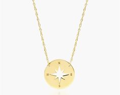 14K Yellow Gold Mini Compass Adjustable Necklace. Always be looking in a stylish direction when you wear this gorgeous necklace. Whether for yourself or a loved one, this necklace makes the perfect gift. Sterling Silver Yellow Gold Compass Design Necklace, Sterling Silver Gold Necklace With Compass Design, Sterling Silver Yellow Gold Necklace With Compass Design, 14k Gold Compass Design Necklace, 14k Gold Compass Design Round Necklace, Elegant Gold Necklace With Compass Design, Elegant Medallion Compass Necklace, Elegant Charm Necklace With Compass Design, White Gold Compass Pendant Necklace