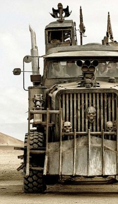 an old truck with skulls painted on it's front grills and grilles