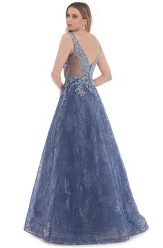 Be the spectacular belle on your next formal event in Morrel Maxie 16299. This masterpiece showcases a plunging V-neckline, adorned with lace appliques, sheer on the sides with an open back and a zipper closure. Adding to the aesthetic of the whole look is a ballgown skirt which features a horsehair hemline. Flatter your finest assets as you enthrall the crowd in this Morrel Maxie creation. Style: morrellM_16299 Fabric: Burnout Jacquard Print/Embroidery Details: Embroidery and Stones, Plunging V Ballgown Dress, Unique Party Dresses, Ballgown Skirt, Designer Dresses For Women, Embroidered Bodice, Ball Gown Skirt, Couture Candy, Print Embroidery, Ball Gown Dresses