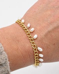 Attention all fashionistas and ocean lovers, prepare to set sail on a journey of luxury and style with the breathtaking Lana Bracelet 🐚

✨Crafted from 14 karat gold filled metal, this stunning bracelet is not only highly durable but also waterproof, making it the perfect accessory for any beach day or boat trip. 

Shop Now! www.shopsculptress.com

#pearlbracelet #pearljewelry #pearl #mermaid #surfergirl #roxy #surfjewelry #waterproofjewelry Pearl Chain Bangle Bracelets, Pearl Bangle Bracelet With Pearl Chain, Handmade Gold Pearl Bracelet, Handmade Gold Pearl Metal Bracelet, Dainty Gold Plated Oyster Bracelet, Dainty Gold-plated Oyster Bracelet, Handmade Adjustable Yellow Gold Pearl Bracelet, Adjustable Handmade Yellow Gold Pearl Bracelet, Gold Plated Pearl Bracelet With Adjustable Chain As Gift