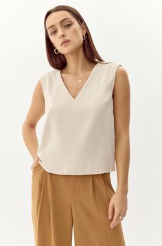 Yoona V-Neck Top | Greylin Collection – Greylin Collection | Women's Luxury Fashion Clothing Hoi An Tailor, Tops And Blouses, Sleeveless Top Designs, Sweater Jumpsuit, Luxury Women Fashion, Low Iron, Top Sleeveless, Material Design, V Neck Tops