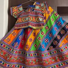 Lehenga Chunni Sets Multicolor Dress For Diwali Ceremonies, Multicolor Dresses For Diwali Ceremonies, Multicolor Dresses For Diwali And Traditional Ceremonies, Multicolor Dresses With Traditional Patterns For Diwali, Festival Anarkali Set With Multicolor Embroidery And Motifs, Multicolor Motifs Dress For Festivals, Bollywood Style Multicolor Sharara With Motifs, Navratri Multicolor Sharara With Motifs, Festive Multicolor Motifs Lehenga