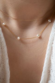 Gorgeous pearl station necklace that is perfect for everyday and layeringSimple and delicate bracelet - Perfect for Stacking & Layering or even alone.• Pearl measures approx. 5mm• Gold filled• Fresh water pearls• Perfect gift for Bridesmaids, Bride Dainty Akoya Pearl Necklace With Delicate Chain, Dainty Pearl Necklace For Layering, Dainty Pearl Necklace For Layering With Pearl Chain, Dainty Pearl Necklace With Satellite Chain, Layering Pearl Necklace With Delicate Chain, Classic Pearl Pendant Necklace For Layering, Delicate Everyday Pearl Necklace With Delicate Chain, Classic Pearl Necklace For Layering, Classic Layering Pearl Necklace