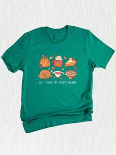 Welcome to our shop, where we celebrate all things autumn and Thanksgiving with our unique and stylish collection of t-shirts.  This Thanksgiving shirt is the perfect addition to your festive wardrobe. Made from comfortable fabric, it will keep you cozy throughout the season.  Our funny Thanksgiving design combines all the elements that make this holiday special. With a delightful turkey and iconic fall symbols like pumpkins, it captures the essence of autumn.  Whether you're attending a Thanksg Holiday Letter Print T-shirt For Fall, Funny Cotton Tops For Fall, Funny Graphic Print Shirt For Fall, Funny Short Sleeve Tops For Fall, Funny Print Relaxed Fit Shirt For Fall, Relaxed Fit Shirt With Funny Print For Fall, Green Tops For Fall Holiday, Fall Crew Neck Shirt With Funny Print, Green Graphic Tee For Fall