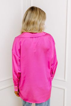 – Simple and stunning for a sweet night out – Lightweight, soft textured material – V-cut, collared neckline – Long, loose sleeves with button closure cuffs – Relaxed, flattering silhouette that ends in a straight upper-thigh hemline Sweet Night, Loose Sleeves, V Cut, V Cuts, Hip Length, Soft Textures, Distressed Jeans, Hot Pink, Night Out