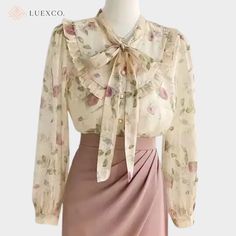 Luexco Floral Chiffon Blouse Long Bubble Sleeve Top Front 1 Elegant Long Sleeve Chiffon Blouse, Elegant Pink Chiffon Top, Elegant Chiffon Blouse For Fall, Feminine Blouse With Ruffled Collar For Formal Occasions, Elegant Spring Tie Neck Blouse, Elegant Chiffon Blouse With Ruffled Collar, Elegant Beige Tie Neck Blouse, Elegant Pink Long Sleeve Blouse, Elegant Long Sleeve Pink Blouse