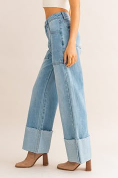 High-waisted, cuffed jeans with an elongating fit! These are a light wash denim with statement pockets along the front side. Relaxed fit, we recommending sizing down one size for a tighter fit. Model is 5’8” wearing size small. Ankle length Cuffed hem Light wash 100% cotton Size guide (in inches): XS: Waist 13.0 (Waist), Hips 18.0, Inseam 30.5, Length 41.5 S: Waist 13.5, Hips 18.5, Inseam 31.0, Length 42.0 M: Waist 14.0, Hips 19.0, Inseam 31.5, Length 42.5 L: Waist 14.5, Hips 19.5, Inseam 32.0, High Cuffed Jeans, Cuffed Jeans, Leg Cuffs, Relaxed Fit Jeans, European Summer, Light Denim, Sheer Fabrics, High Jeans, Fashion Model