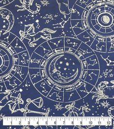 a blue background with white stars and zodiacs on it, as well as a ruler