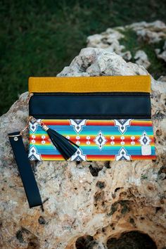 Tame that tantalizing taste of the South with the Mojave Moment Southwestern Aztec Versi Bag! Get that rustic-chic look and feel of a desert-dweller, without all the parched pores. It comes with two long pockets for you to store your items! It can be easily stored in your tote bag or even perfect for weekend travel! Southwestern Style Bags With Adjustable Strap For Everyday Use, Southwestern Style Bag With Adjustable Strap For Everyday Use, Southwestern Style Bag With Adjustable Strap, Multicolor Southwestern Bags For Everyday Use, Southwestern Multicolor Bags For Everyday Use, Southwestern Style Tote Bag For Everyday Use, Multicolor Southwestern Everyday Bags, Southwestern Multicolor Everyday Bags, Multicolor Southwestern Style Everyday Bags