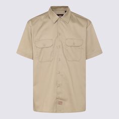 Khaki cotton shirt from Dickies featuring short sleeves, button closure, chest flap pockets, regular fit and cotton logo patch at bottom.Composition: _, 100% Cotton Classic Short Sleeve Button-up Shirt With Snap Buttons, Classic Cotton Button-up T-shirt, Cotton Shirt With Flap Pockets And Spread Collar, Cotton Camp Shirt With Patch Pockets And Spread Collar, Cotton Camp Shirt With Button Closure And Spread Collar, Classic Cotton Short Sleeve Shirt With Patch Pockets, Solid Cotton Camp Shirt With Buttons, Casual Camp Shirt With Patch Pockets, Casual Short Sleeve Camp Shirt With Patch Pockets