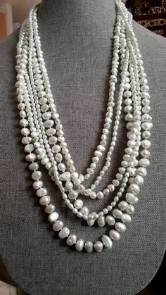 6 strand freshwater Pearl necklace. Adjusts from 28-34". Sterling silver hook clasp Pearl White Multi-strand Beaded Necklace, White Multi-strand Pearl Necklace, Pale Mint Green, Flagstaff Az, Freshwater Pearl Necklace, Flagstaff, Hook Clasp, Freshwater Pearl Necklaces, Multi Strand Necklace