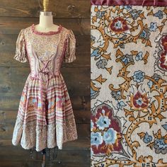 "- Vintage 70's square dance dress in plum, tan and goldenrod with allover blue floral - Scoop neckline with lace up bodice - Short puffed sleeve - Full skirt with ruffled hemline - Back zip closure MEASUREMENTS Bust: 33\" Waist: 25\" Hip: free Shoulder to waist: 15\" Waist to hem: 22\" Shoulder: 13.5\" Sleeve: 8.5\" Vintage labeled size: 6 Best fits: Modern XS / 2  LABEL Western Fashions FABRIC / FIBER 50% rayon / 50% cotton CONDITION Excellent, light wear" Brown Bohemian Dress With Square Neck, Brown Cottagecore Dress For Summer, Brown Bohemian Square Neck Dress, Fitted Peasant Dress With Square Neck For Spring, Fitted Square Neck Vintage Dress For Garden Party, Peasant Style Square Neck Fitted Dress, Vintage Beige Prairie Dress For Garden Party, Square Neck Floral Print Dress For Gatherings, Fitted Dresses For Fall Gatherings