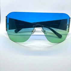 Blue To Green Ombr Shades, Wireless Frame. Casual Blue Shield Sunglasses For Beach, Casual Blue Shield Sunglasses For The Beach, Blue Casual Shield Sunglasses For Beach, Casual Green Shield Sunglasses For Summer, Modern Blue Shield Sunglasses For Summer, Modern Blue Sunglasses For Vacation, Trendy Blue Shield Sunglasses For Beach, Blue Summer Sunglasses For Vacation, Blue Sunglasses For Summer Vacation