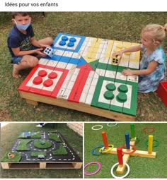 two children playing with wooden toys in the grass and one child sitting on the ground