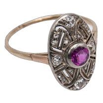 A former Art Deco ring from the 1920s.  Made of 0.585 yellow gold and 0.990 silver.  Central natural pink ruby weighing 0.40ct surrounded by diamonds with a total weight of 0.25ct (SI-VS)  Preserved hallmark for Hungary in the 1920s.  Item weight: 2.17g  Size: 15 - correction possible Vintage Pink Diamond Ring Hallmarked, Vintage Pink Diamond Ring With Hallmark, Antique Ruby Rings With Single Cut Diamonds, Antique Ruby Diamond Ring Hallmarked, Vintage 14k Gold Ruby Ring With Diamonds, Vintage 14k Gold Ruby Ring With Single Cut Diamonds, Vintage Ruby Rings With Single Cut Diamonds, Vintage Pink Hallmarked Rings, Antique Style Brilliant Cut Yellow Gold Ruby Ring