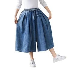 Short culottes denim pants online—excellent jeans for women from the 2022 Spring-Summer collection. Casual-style outfits are more comfortable to wear. Blue color denim is the most popular denim color, practically suits all other clothes. An unrubbed design provides a more sleek look. From a distance, you can’t tell the difference between culottes and a skirt, making them incredibly comfy. A high-waisted rise is particularly fit for those who want to lengthen their legs and highlight the figure. Denim Culottes, Skirt Making, Jeans Street Style, Jean Jacket Women, Denim Color, Street Outfit, Jeans For Women, Wearing Clothes, Formal Attire