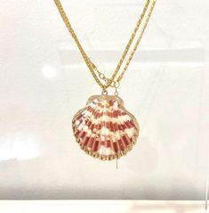 Handmade gold natural shell necklace. Its made with a real calico scallop shell on a gold plated chain.  Please note that shape, color, and size of the natural seashell charm will vary slightly since no two shells are the same  ~Material~ High quality 18k gold plated stainless steel chain. ~Length~ 16 inches can be adjusted to 18 inches. M O R E * I N F O R M A T I O N ~Care instruction~ Please remove it before bathing or swimming. Avoid your jewelry touching chemicals such as hairsprays or perfumes. ~Shipping~ After receiving your order processing time may take 1-2 working days. All the products will be sent via air registered mail / first class international with tracking number. ~Packaging~ All necklaces come in their own jewelry box perfect for gift giving or storage. Thankyou for visi Gold-tone Pendant Necklace For Gift, 14k Gold-filled Pendant Charm Necklace With Clavicle Chain, Rose Gold Plated Pendant Chain Necklace, Gold-tone Clavicle Chain Necklace For Gift, Gold-tone Chain Necklace With Round Pendant Gift, Gold-tone Round Pendant Chain Necklace Gift, Rose Gold 14k Gold-filled Pendant Necklace, 14k Rose Gold Filled Pendant Necklace, Handmade Gold-tone Chain Necklace Gift