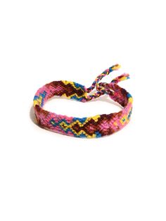 a pink, yellow and blue braided bracelet on a white background with an orange cord