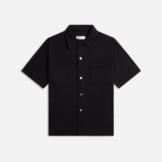 Casual Collared T-shirt For Work, Modern Button-up Shirt With Placket, Black Cotton Shirt With Concealed Placket, Black Collared Shirt With Buttoned Pockets, Modern Button-up Shirt With Welt Pockets, Black Camp Collar Top With Pockets, Classic Black Shirt With Welt Pockets, Black Shirt With Pockets And Spread Collar, Black Short Sleeve Tops With Welt Pockets