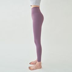 18% spadex/ 82% Polyethylene Model is 5'6" and wearing purple small. High Stretch Purple Functional Activewear, Micro-elastic Purple Activewear For Workout, Purple Micro-elastic Activewear For Workout, Purple Breathable Yoga Activewear, Purple Yoga Activewear With 4-way Stretch, Purple 4-way Stretch Activewear For Yoga, Purple Compressive Yoga Tights, Functional Stretch Purple Bottoms, Purple 4-way Stretch Yoga Activewear