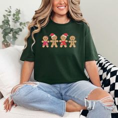 Celebrate the festive season in style with our delightful Christmas Gingerbread Shirt! This cute Christmas shirt features charming gingerbread cookies and is perfect for anyone who loves holiday baking. Whether you're part of the cookie crew or looking for a funny Christmas tee to wear to a Christmas party, this shirt will surely put a smile on your face. Ideal for matching Christmas pajamas or as a thoughtful Christmas matching gift for loved ones, it's a great way to spread holiday cheer. Make Christmas Cookie Shirt, Gingerbread Shirt, Cookie Shirt, Cute Christmas Shirt, Matching Christmas Pajamas, Cute Christmas Shirts, Christmas Matching, Matching Gifts, Christmas Gingerbread