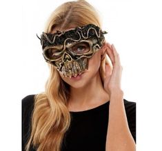 This deluxe plastic Skull Voodoo Half Mask provides the perfect addition to your scary costumes, devils and demons, Voodoo, steampunk, Victorian and more for Halloween, cosplay or parties. Its authentic style adds the ideal finishing touch. Spot clean. One size fits most adults and teens. Other costumes and accessories are sold separately on our page - subject to availability. One size fits most teens and adults - straps on the back are elastic.