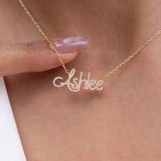 "This 14k personalized diamond name necklace is the perfect gift for the bridal party, someone special, or yourself.  How to order 1- Pick the fonts you like and send us a message 2- We will send you a picture of your name with the fonts you chose 3- If you like it any of them, place your order. 4- We send a final 3d mock up for approval. 5- Once approved we go ahead and finish your necklace. M A T E R I A L & L E N G T H Available in 14k Yellow Gold, 14k Rose Gold, 14k White Gold, Sterling Silver Stone: Natural Diamonds Thickness: 1.3mm / 0.05\" Initials Lowercase: 4-6 mm (Depending on the font) Capital: 9-12 mm (Depending on the font) Diamond weight: 0.15 ct. - 0.70 ct. depending on the name Chain Length:  14+2, 16+2 options or any length up to 20 inches without extension. (Please leave Elegant Name Necklaces For Anniversary Gift, Elegant Custom Name Necklace For Anniversary, Elegant Personalized Necklace For Anniversary Gift, Dainty Name Necklace For Anniversary, Customizable Gold Name Necklace For Wedding, Elegant Customized Name Necklace For Anniversary Gift, Elegant Personalized Name Necklace For Anniversary, Elegant Customizable Necklace For Anniversary Gift, Elegant Customizable Necklace For Anniversary