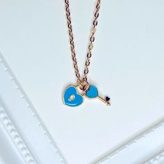 Brand New Handmade Rose Gold Tone Heart Lock And Key Double Charms / Pendants Necklace 0.5in X 0.4in Blue Enamel Heart Lock 0.6in X 0.25in Blue Enamel Heart Key (Available In Red Or Black Enamel. See Separate Listings) 18 Inch Rose Gold Plated Chain Bundle & Save! Blue Dainty Necklace With Heart Charm, Dainty Blue Necklace With Heart Charm, Dainty Blue Heart-shaped Necklace, Blue Dainty Jewelry For Valentine's Day, Dainty Blue Necklace For Valentine's Day, Blue Necklace For Valentine's Day Gift, Personalized Blue Necklace As A Gift For Her, Personalized Blue Necklace Gift For Her, Personalized Blue Necklace For Her