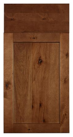 a close up view of a wooden cabinet door with wood grains on the bottom