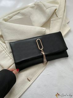 BirdinBag - Chic Black Envelope Bag with Elegant Metal Tassel Decoration for Daily Use Rectangular Clutch With Tassels For Daily Use, Elegant Clutch Bag With Tassels, Black Envelope Clutch For Daily Use, Chic Clutch Bag With Tassels, Chic Clutch Shoulder Bag With Tassels, Chic Rectangular Shoulder Bag With Tassels, Chic Tassel Clutch Shoulder Bag, Chic Tassel Clutch Bag, Elegant Black Bag With Tassels