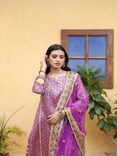 With festivals around the corner, wardrobe update is mandatory. Presenting brocades like never before. Made in straight silhouette with narrow pants and organza dupatta, which is beautified with lovely hand work. Taari and gotta detailing on dupatta is just the right touch. Color: Purple Fabric: Kurta & Bottom- Brocade Dupatta - Organza Note: Length and sizes can be customised Length - Kurta 40 inches Pants 38 inches Available in other colors If you happen to see some deformity in hand-work or f Raw Silk Churidar With Dupatta, Jamawar Anarkali Set For Navratri, Chanderi Churidar With Zari Work, Chikankari Embroidered Tissue Silk Sets For Navratri, Chikankari Embroidery Tissue Silk Sets For Navratri, Raw Silk Sets With Sheer Dupatta, Art Silk Churidar With Sheer Dupatta, Brocade Sharara For Festivals, Chikankari Embroidery Dupatta In Tissue Silk