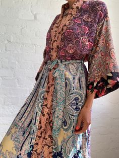 "This is free size patchwork robe, super comfy around the house and as an outside long boho style topper  Perfect on the beach, hotel or spa can also be worn on its own or layered over jeans and t shirt MEASURE made free size length 55\" MATERIAL *silk and polyester  *no lining  More boho style ideas at  https://www.etsy.com/shop/AltheaStores Thank You for looking" Multicolor Patchwork Kimono For Vacation, Multicolor Wrap Kimono For Festivals, Multicolor Long Kimono With Boho Print, Multicolor Wrap Kaftan For Beach, Long Multicolor Boho Kimono, Hippie Multicolor Open Front Kimono, Multicolor Long Kimono For Loungewear, Maxi Length Boho Print Kimono For Beach, Multicolor Free Size Boho Print Kimono