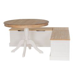 a white table with two drawers and a round wooden table top on one end, next to a smaller piece of furniture in the other side