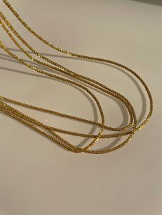 MARGARITA NECKLACE | GOLD Gold Glitter Rock Chain | 2MM 18K Gold Plated Sterling Silver 16" Length Gold Charm Necklaces For Parties, Gold Snake Chain Choker With Delicate Details, Gold Charm Necklace With Clavicle Chain, Gold Delicate Snake Chain Choker, Gold Long Charm Necklaces For Parties, Dainty Yellow Gold Necklaces For Party, Dainty Yellow Gold Chain Necklace For Party, Dainty Yellow Gold Necklace For Party, Dainty Yellow Gold Party Necklace