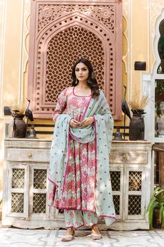 The set consists of printed anarkali kurta with lace detailing on the edges teamed with printed pants and a dupatta with embroidery detailing.The entire set has beautiful lace detailing. Kurta Length-48 inches Palazzo Length-38 inches Dupatta Length-2.5 meters Work-Print Detailing Color-Pink & Light Blue Kurta Fabric-Cotton Bottom Fabric-Cotton Dupatta Fabric-Cotton Model Size- 5.8 tall wearing small size Sleeves - 3/4th Sleeves Neck-Round neck Washing Care-Hand wash or Dry Clean Floral Print Anarkali, Printed Anarkali Suits, Printed Anarkali, Blue Kurta, Anarkali Kurta, Embroidery Detailing, Cotton Dupatta, Embroidered Dupatta, Organza Dupatta