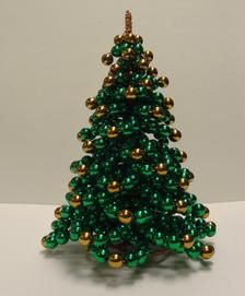 a green and gold beaded christmas tree ornament