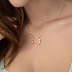 "❤️ Inner Circle Necklace ❤️ H O W ∙ T O ∙ O R D E R 1- Select your preferred Finish from the menu. 2- Choose your necklace length. 3- Write the custom words you want on your necklace.  PRODUCT ∙ DETAILS * Ring Pendant Width is 13 mm * Outer Ring Diameter is 21mm * Ring Thickness is 100 microns * Chain sizes range from 14-22 inches * Featured Font name is Arial * Maximum Characters for Circle is 20 Letters *Necklace can be personalized with an engraving on the OUTSIDE and/or INSIDE of the circle. The DEFAULT is for the engraving to be placed on the INSIDE of the circle as pictured (unless you request otherwise). If you want both sides engraved, please select \"Both Sides\" option. W H Y ∙ CHOOSE ∙ THIS ∙ GLAMORISTIC ∙ NECKLACE? * Designed with unique and delicate style * Crafted meticulous Oval Pendant Halo Jewelry For Gift, Halo Oval Pendant Jewelry As Gift, Simple Design Rose Gold Jewelry, Simple Round Rose Gold Jewelry, Necklace With Ring On It, Rose Gold Circle Jewelry For Anniversary, Rose Gold Round Jewelry For Mother's Day, Delicate Hoop Jewelry As Gift, Minimalist Halo Necklace As Gift