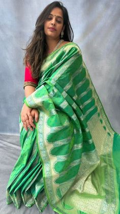 Inspired by ancient Mughal architecture, this beautiful dual tone  mashru silk saree has intricate gold zari weaving in mehrab pattern and has small buttis in blue contrast colour all over the body. Blouse: parrot green mashru silk material [Unstitched] please send us a message if you want blouse material separated  and pico done  ( no extra charge) Green Cutdana Traditional Wear For Eid, Festive Green Pre-draped Saree With Zari Weaving, Festive Green Paithani Silk Pre-draped Saree, Green Paithani Silk Pre-draped Saree With Self Design, Green Dola Silk Pre-draped Saree For Diwali, Green Pre-draped Saree With Zari Weaving For Diwali, Festive Green Tussar Silk Blouse Piece, Green Wedding Saree With Traditional Patterns, Green Semi-stitched Blouse Piece With Traditional Patterns