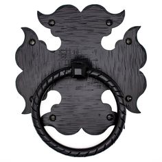 a black metal door handle with an intricate design