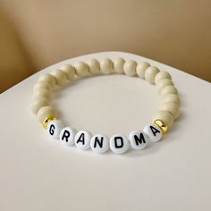 This cute Grandma bracelet is the perfect to gift to your mom or grandma this Mother's Day! Adjustable and lightweight :) Diameter: 6.5cm Handmade with love in Chicago.  Thank you for supporting our small business! Grandma Bracelet, Cute Grandma, Grandma Birthday Gift, New Grandma Gift, Birthday Gifts For Grandma, Grandma Birthday, New Grandma, Grandma Gift, Gift For Grandma