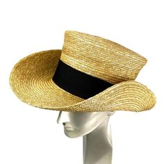 Cowboy straw top hat with large brim.Made with 8/9 milimeters natural straw braid and embellished with a 50 millimeters wide grosgrain ribbon. Western top hat for man and woman.Measurements in centimeters are 37 x 25. Crown height 12. Brim length 8. These measurements may have some slight variation depending on the size of the hat.Custom hat options:1- You can choose between a grosgrain ribbon inside or a genuine leather inner band.2- I usually wear a black grosgrain ribbon as a hat trim, but if Short Brim Straw Hat For Western-themed Events, Gold Brimmed Straw Hat, Western Gold Fedora With Short Brim, Western Style Gold Fedora With Short Brim, Gold Wide Brim Straw Hat For Kentucky Derby, High Crown Straw Hat For Summer Vacation, Gold Wide-brim Straw Hat For Kentucky Derby, Gold Flat Brim Hat Bands For Kentucky Derby, Summer Vacation High Crown Straw Hat