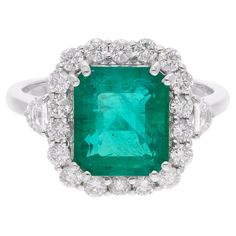 Item Code :- SER-22783 Gross Wt. :- 4.82 gm 18k White Gold Wt. :- 3.95 gm Natural Diamond Wt. :- 0.81 Ct. ( AVERAGE DIAMOND CLARITY SI1-SI2 & COLOR H-I ) Emerald Wt. :- 3.52 Ct. Ring Size :- 7 US & All ring size available ✦ Sizing ..................... We can adjust most items to fit your sizing preferences. Most items can be made to any size and length. Please leave a note at checkout or contact us via 1stDibs conversation. Even after purchasing the item, you can still ask us to adjust the size or length. We will try our best to fix it if it is possible. ✦ Import Duties, Taxes and Custom Charge ..................... Import duties, taxes and customs charges are not included in the items price or shipping cost. These charges are the buyer's responsibility. Please check with your country's c Cocktail Ring Diamond, Jewels Rings, Handmade Fine Jewelry, Zambian Emerald, Diamond Cocktail Rings, White Gold Jewelry, Emerald Gemstone, Ring Diamond, Zambia