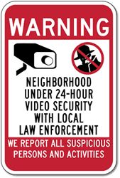 a red and white warning sign with the words,'we report all suspicious persons and activities '