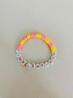 If you like summertime🏖️here's a pink lemonade bracelet Playful Pink Jewelry For Summer, Summer Playful Beaded Bracelets With Letter Beads, Playful Summer Friendship Bracelets With Letter Beads, Playful Summer Beaded Bracelets With Letter Beads, Fun Beaded Stretch Bracelet For Summer, White Stretch Bracelet For Beach In Spring, Trendy Spring Friendship Bracelets With Letter Beads, White Stretch Bracelet For Beach Spring Season, Playful Letter Beads Friendship Bracelets For Summer