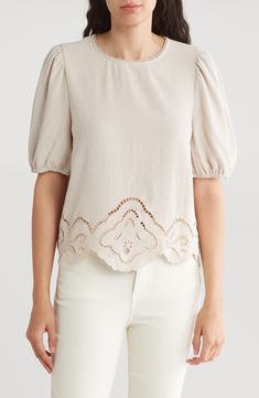 Charming puff sleeves frame this top that's bordered with airy eyelets and scalloped trim. Back keyhole with button-and-loop closure Jewel neck Short sleeves 100% polyester Machine wash, line dry Imported Scalloped Trim, Woven Top, Jewel Neck, Adrianna Papell, Puff Sleeves, Nordstrom Rack, Puff Sleeve, Shirt Blouses, Top Blouse