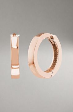 Versatile 10mm square tubes are polished to a high shine in these classic women's huggie earrings. Fashioned in 14K rose gold, the earrings secure in place with hinged backs. Classic Rose Gold Huggie Earrings For Formal Occasions, Classic Small Hoop Rose Gold Huggie Earrings, Modern Small Hoop Huggie Earrings In Rose Gold, Classic Rose Gold Small Hoop Huggie Earrings, Classic Rose Gold Huggie Earrings For Anniversary, Modern Rose Gold Huggie Earrings With Polished Finish, Formal Rose Gold Huggie Earrings With Polished Finish, Modern Rose Gold Hoop Huggie Earrings, Minimalist Rose Gold Huggie Earrings For Formal Occasions