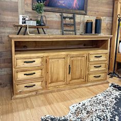 Embrace a classic rustic aesthetic with the Sierra Tv Stand finished in a warm natural stain and contrasting black metal hardware. This piece is timeless and build to last! LT-TVST-70-MED W(in): 69.69 - H(in): 35.83 - D(in): 19.69 Crate Tv Stand, Tv 70, Rustic Tv Console, Rustic Tv Stand, Dog Crate Furniture, Leather Sofa Set, Rustic Aesthetic, Dog Furniture, Office Furniture Desk